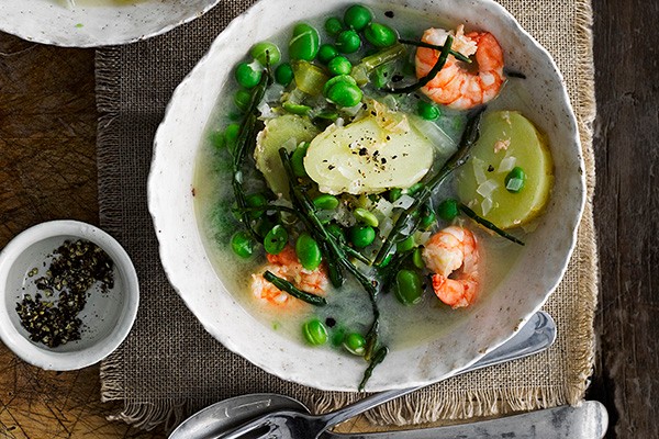 A bowl of Jersey Royals Spring Soup with prawns