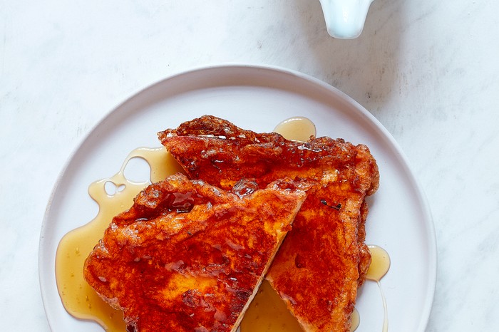 Torrijas with honey on a plate