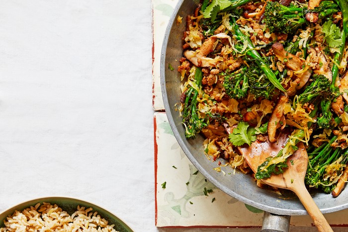 Fried Rice with Broccoli and Mushrooms in a Wok